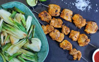 Photo: Sriracha and lime chicken kebabs with pak choi